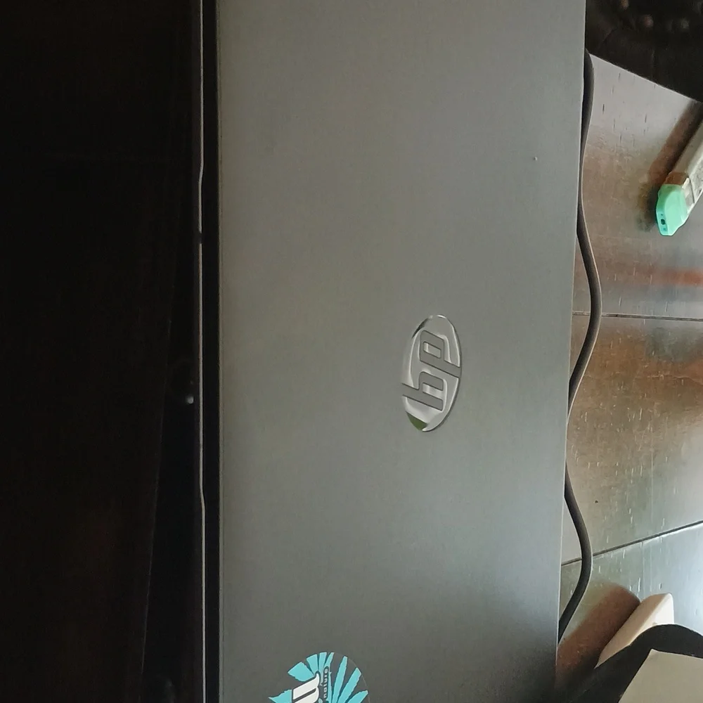 HP Laptop with Pink and Blue Display